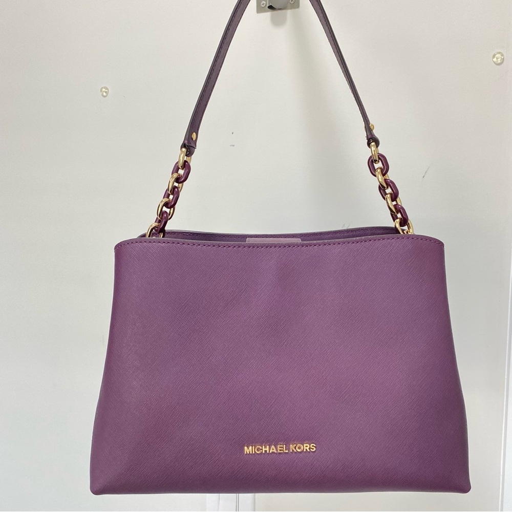 Michael Kors burgundy/ purple satchel with jet set travel pouch included